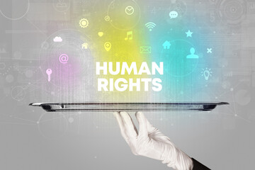 Waiter serving social networking with HUMAN RIGHTS inscription, new media concept
