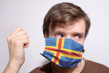 Young man wearing Åland face mask during coronavirus pandemic
