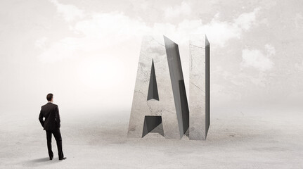 Rear view of a businessman standing in front of AI abbreviation, attention making concept