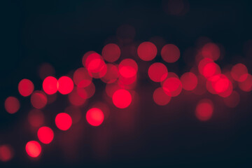 Bright red bokeh effect on black background