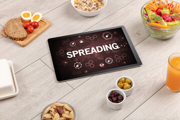 Healthy Tablet Pc compostion with SPREADING inscription, immune system boost concept