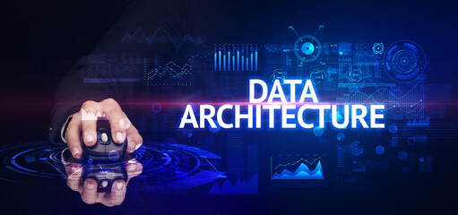 Fototapeta premium hand holding wireless peripheral with DATA ARCHITECTURE inscription, modern technology concept