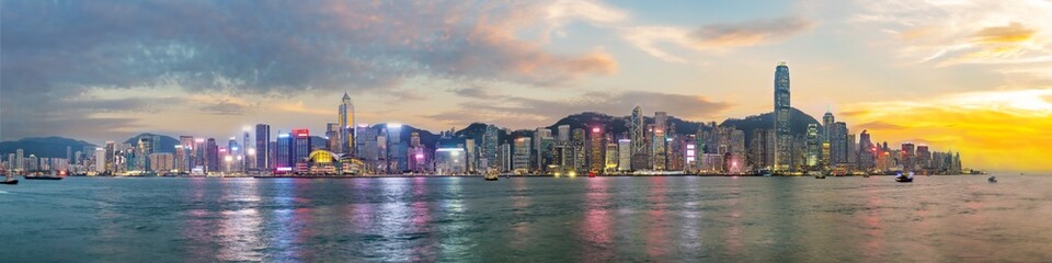 Panorama view of Hong Kong skyline on the evening seen from Kowloon, Hong Kong, China.