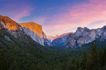 Yosemite valley nation park during sunset view from tunnel view on twilight time. Yosemite nation park, California, USA. Panoramic image.