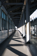 subway station under sunshine. Perspective platform background.