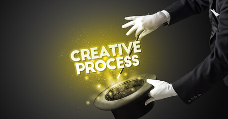 Illusionist is showing magic trick with CREATIVE PROCESS inscription, new business model concept