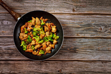 Chinese delicious dish stir-fry chicken with broccoli.