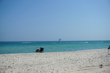 couple sitting on the beach