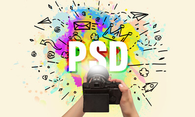 Close-up of a hand holding digital camera with abstract drawing and PSD inscription