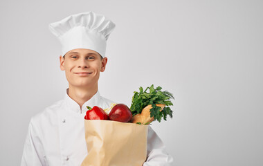 chef with a food package in food preparation professional restaurant