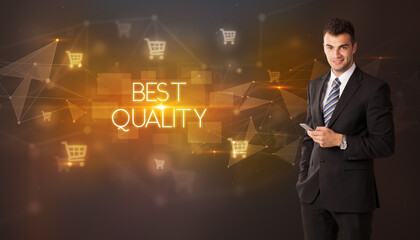 Businessman with shopping cart icons and BEST QUALITY inscription, online shopping concept