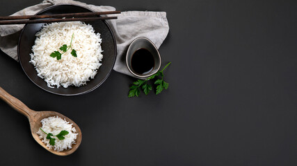 Asian-style boiled rice with chopsticks on the side