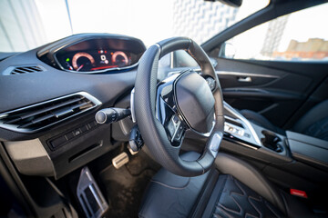 driver's seat and steering wheel of a modern fashionable car
