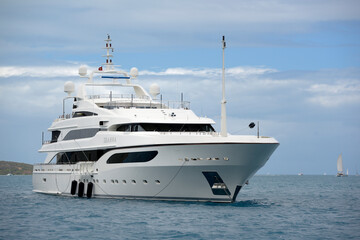 Fototapeta na wymiar The 65m Benetti motor yacht Seanna anchored in North Sound. Charter rates in the Mediterranean start at €434,000 per week, Virgin Gorda, British Virgin Islands