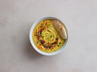 Hummus with seasonings and pita. Healthy eating. Vegetarian food. Diet.
