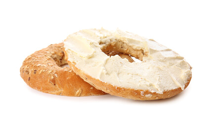 Fresh bagel with tasty cream cheese on white background