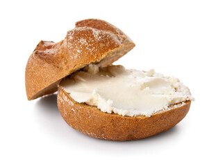 Fresh bun with tasty cream cheese on white background