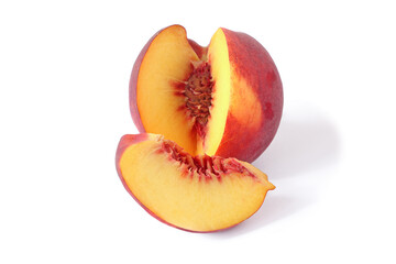Cut peach and slices isolated on white background