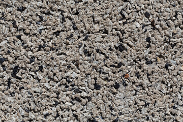 Crushed granite stones wall - close up