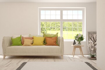 Minimalist living room in white color with sofa and summer landscape in window. Scandinavian interior design. 3D illustration