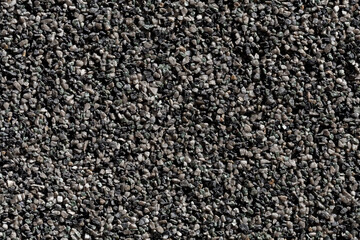Crushed granite stones wall - close up