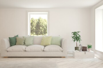White living room with sofa and summer landscape in window. Scandinavian interior design. 3D illustration