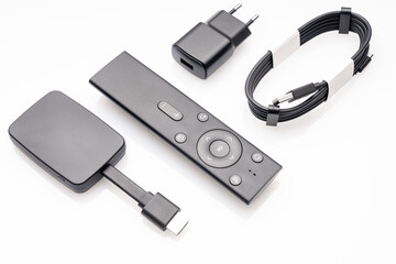 wireless internet TV set, set-top box and modern remote control, white background, selective focus, telecommunications equipment and technology concept