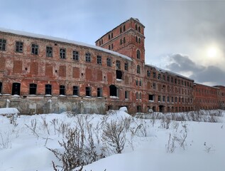 old history factory of 19 century in ruins and abandoned with snow  in Ulyanovsk Oblast, Russia