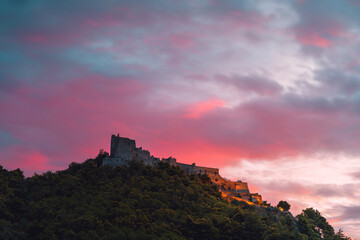 Obraz premium the castle of Arechi in Salerno at sunset and sunrise