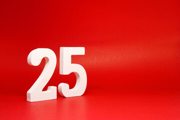 Twenty Five ( 25 ) white number wooden Isolated Red Background with Copy Space - New promotion 25% Percentage  Business finance Concept 