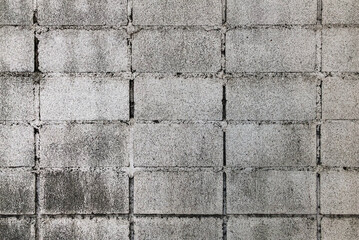 Old concrete block wall texture for background.