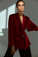 pretty woman in red blazer fashion attractive look studio luxury