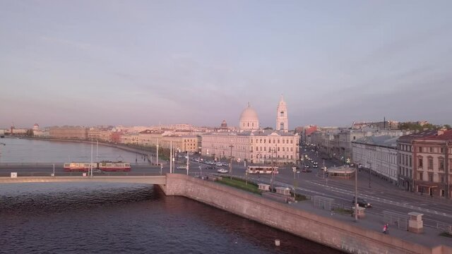 Aerial View on Saint-Petersburg Tuchkov Bridge and Vasilievski Island Embankment with Evening Traffic on Sunset