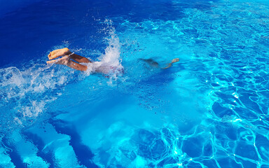 man jumped into the blue pool