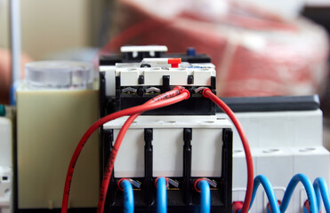 selective focus of wired electrical contactor installed on the contact panel 