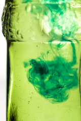 Paint stains in a jar of water