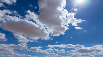Naklejka na ściany i meble Blue Sky With White Clouds On A Sunny