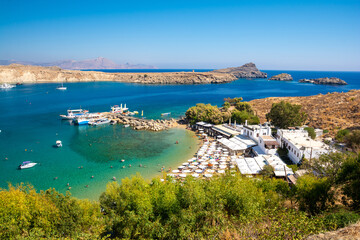 Fototapeta na wymiar beautiful bay with beach in Lindos on Rhodes island in Greece