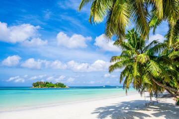 Single tropical island with blue sky and turquoise water, Seychelles