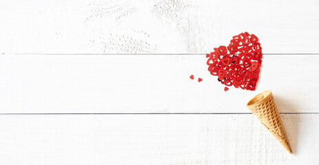 ice-cream corn on white wooden background with red heart shape decorations,  romantic, Valentines concept, copy space © 18042011