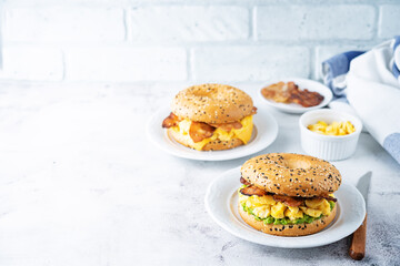 Fried bacon avocado cheese egg salad  bagel