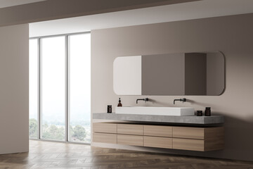 Light wooden bathroom with two sinks and mirror, marble floor