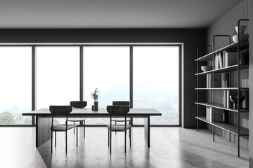 Grey kitchen room with dining table and four chairs near window, marble floor