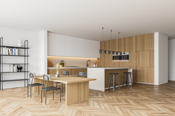 Wooden kitchen room with dining table and chairs, parquet floor © ImageFlow