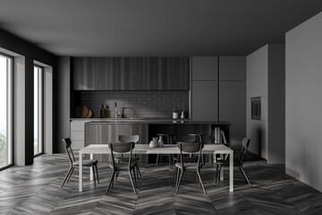 Dark grey kitchen set with eating table and chairs, window and black parquet