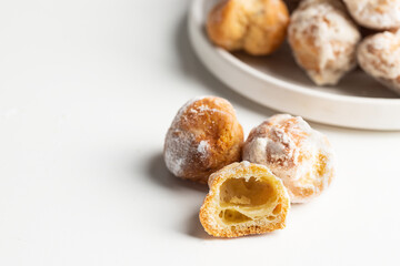 Small  deep fried doughs, Banuelos, sweets made from wheat , sugar and spices.