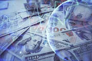 Multi exposure of forex chart drawing over us dollars bill background. Concept of financial success markets.