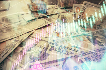 Multi exposure of forex chart drawing over us dollars bill background. Concept of financial success markets.