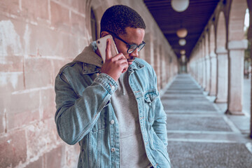black man talking on mobile phone