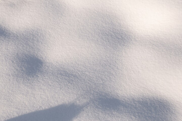 White background with fresh snow and shadows